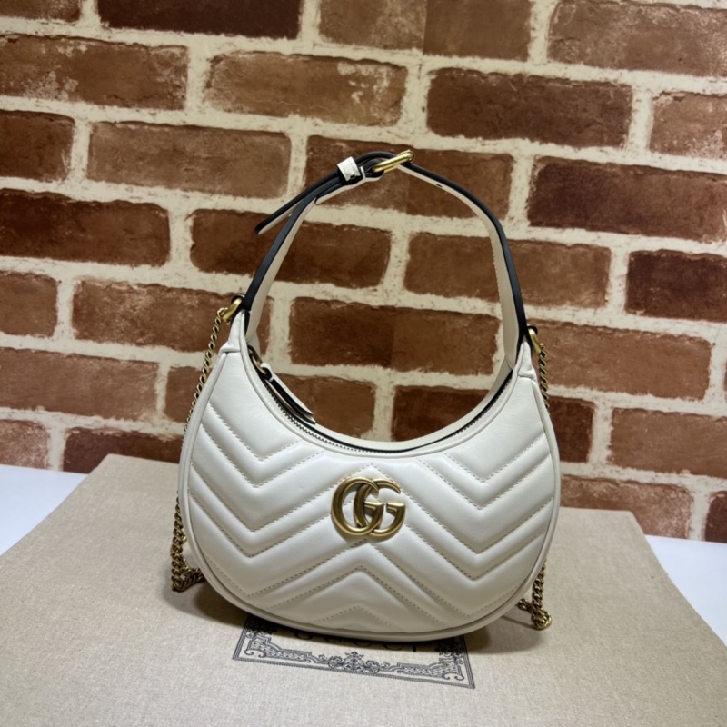 G*u*i top handle bags